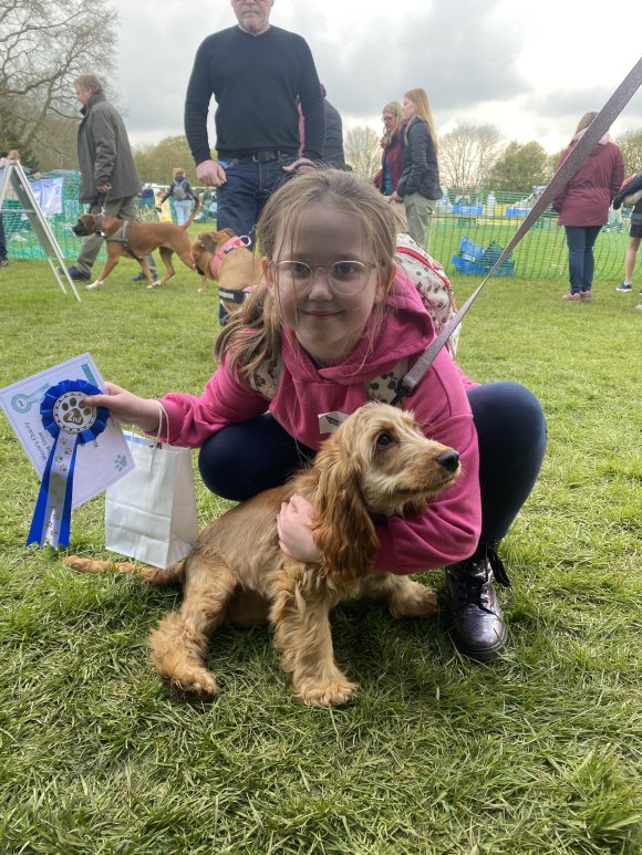 Young handler winner and their cute dog